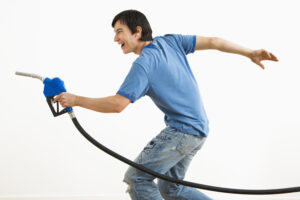 man holding gas pump