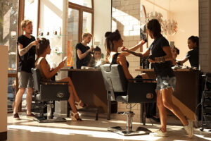 women getting a hair cut at a hair salon