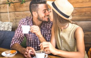 a couple looking at each other romantically and rubbing their noses together
