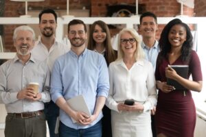 happy diverse professional business team stand in office